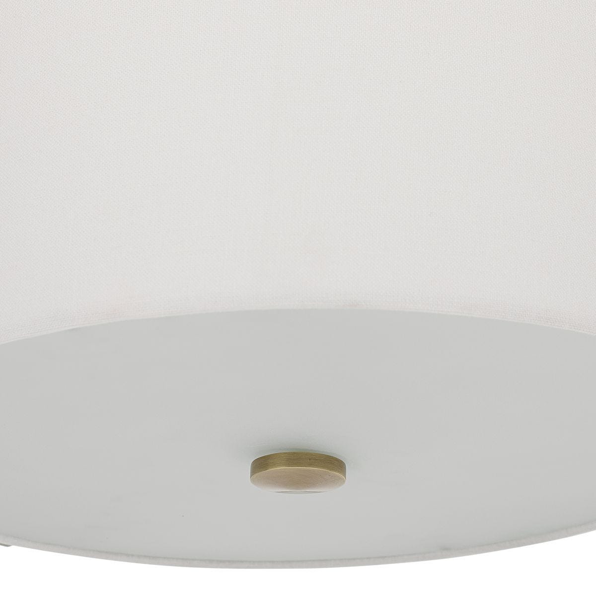 Close-up of antique brass hardware detail on Fallowmere 3-light semi flush
