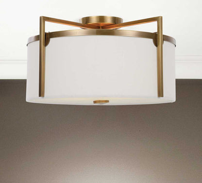 Fallowmere 3-light semi flush mount with antique brass finish and off-white linen shade