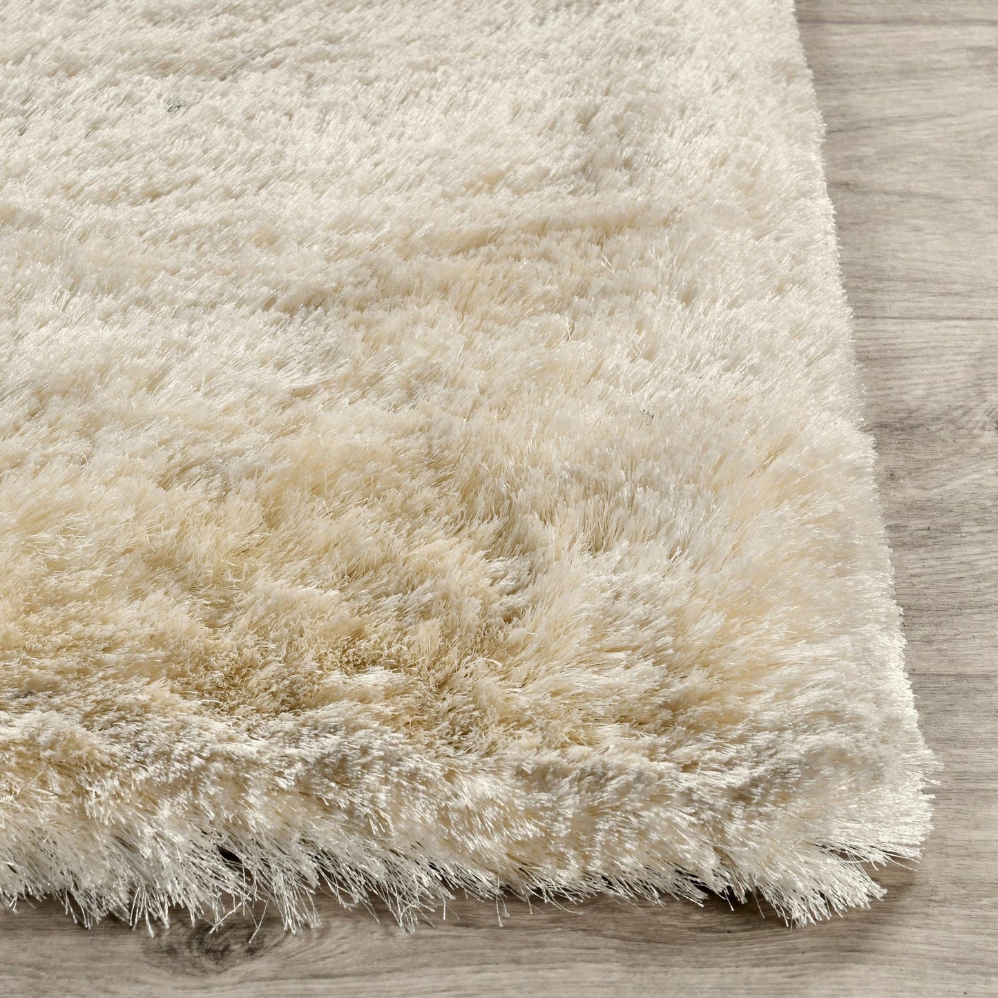 Ivory 80% Polyester Wool & Wool Blend Carter Shag Rug Collection