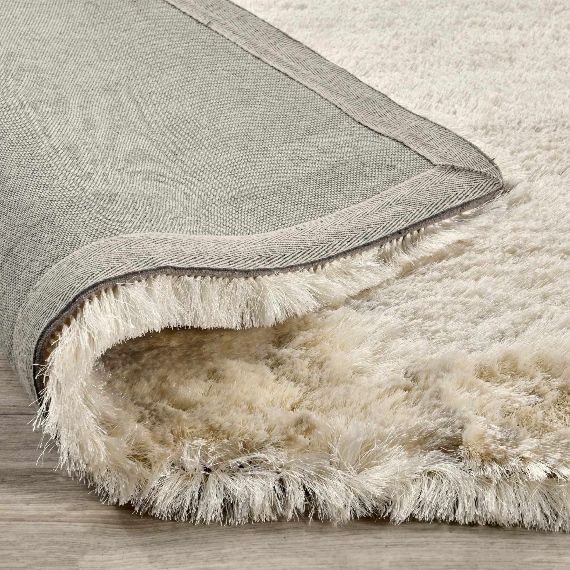 Ivory 80% Polyester Wool & Wool Blend Carter Shag Rug Collection