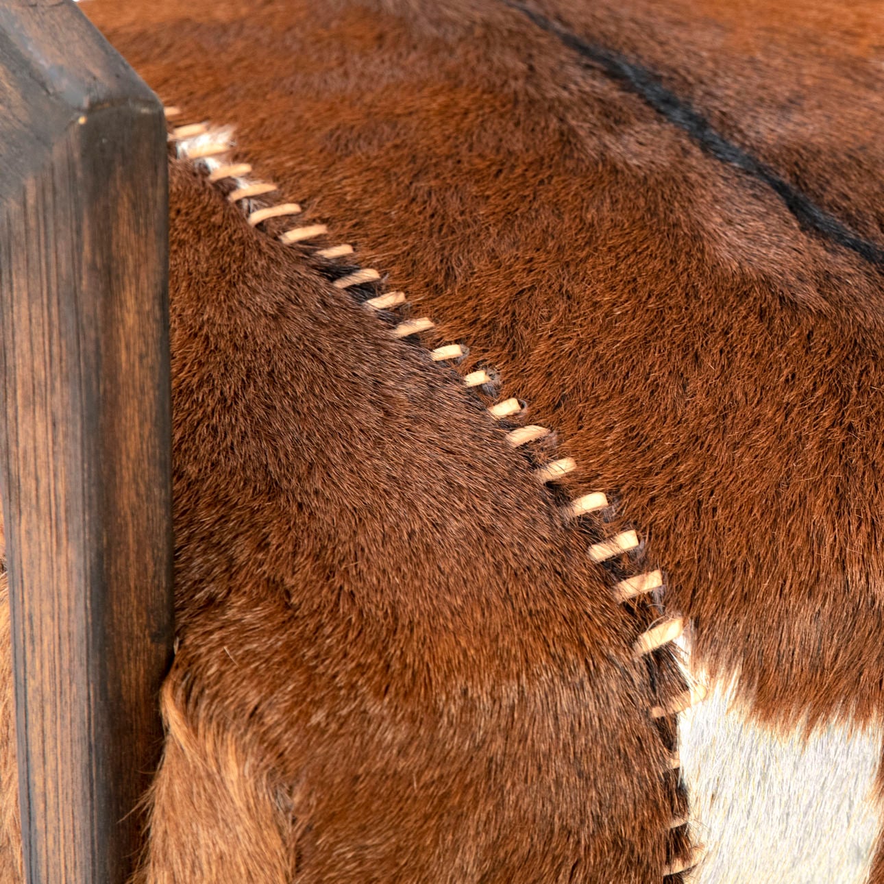 Natural Brown Finish Goat Hide and Mindi Wood Chair 30 in Wide